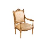 In the manner of Antoine Gaillard; a finely carved wood and gilt gesso fauteuil, 19th century,