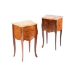 A matched pair of Louis XV style marble topped king wood and tulipwood two drawer petit commodes,