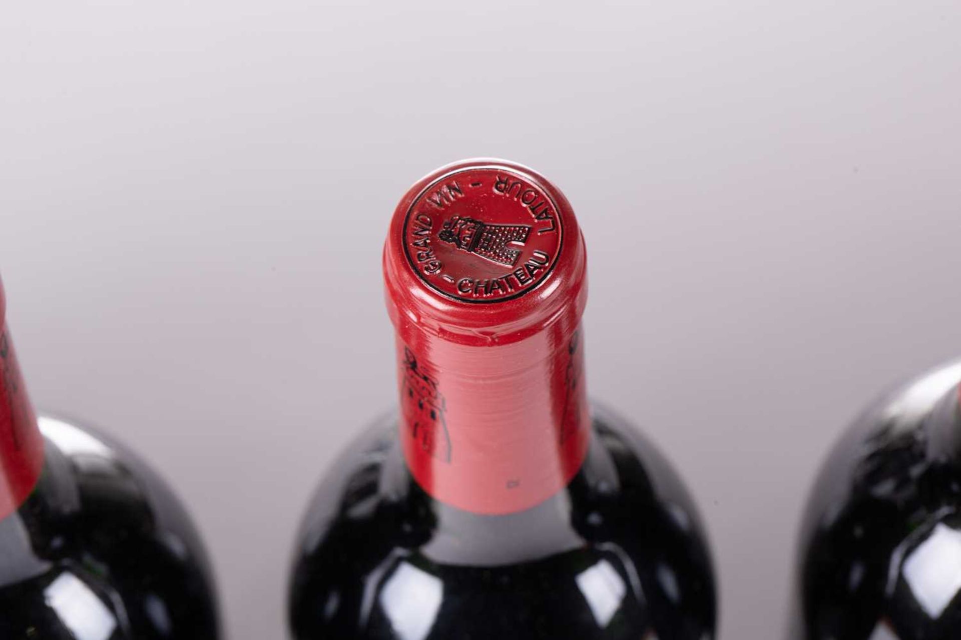 A twelve bottle case of Grand Vin de Chateau Latour, 1988, tissue wrapped bottles, ullage bottom - Image 17 of 21