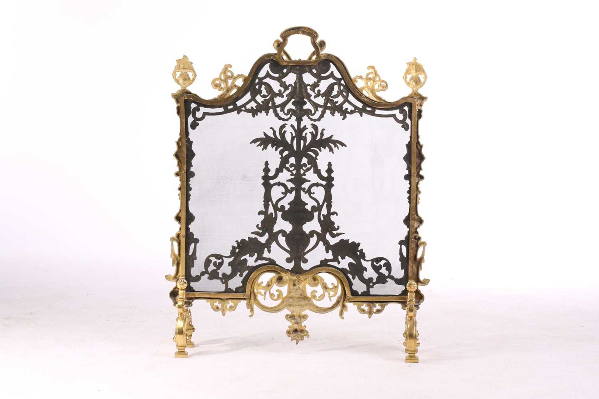 A Louis XVI-style heavy ormolu spark guard, late 20th century, with a shaped arch top above a pieced - Image 3 of 10