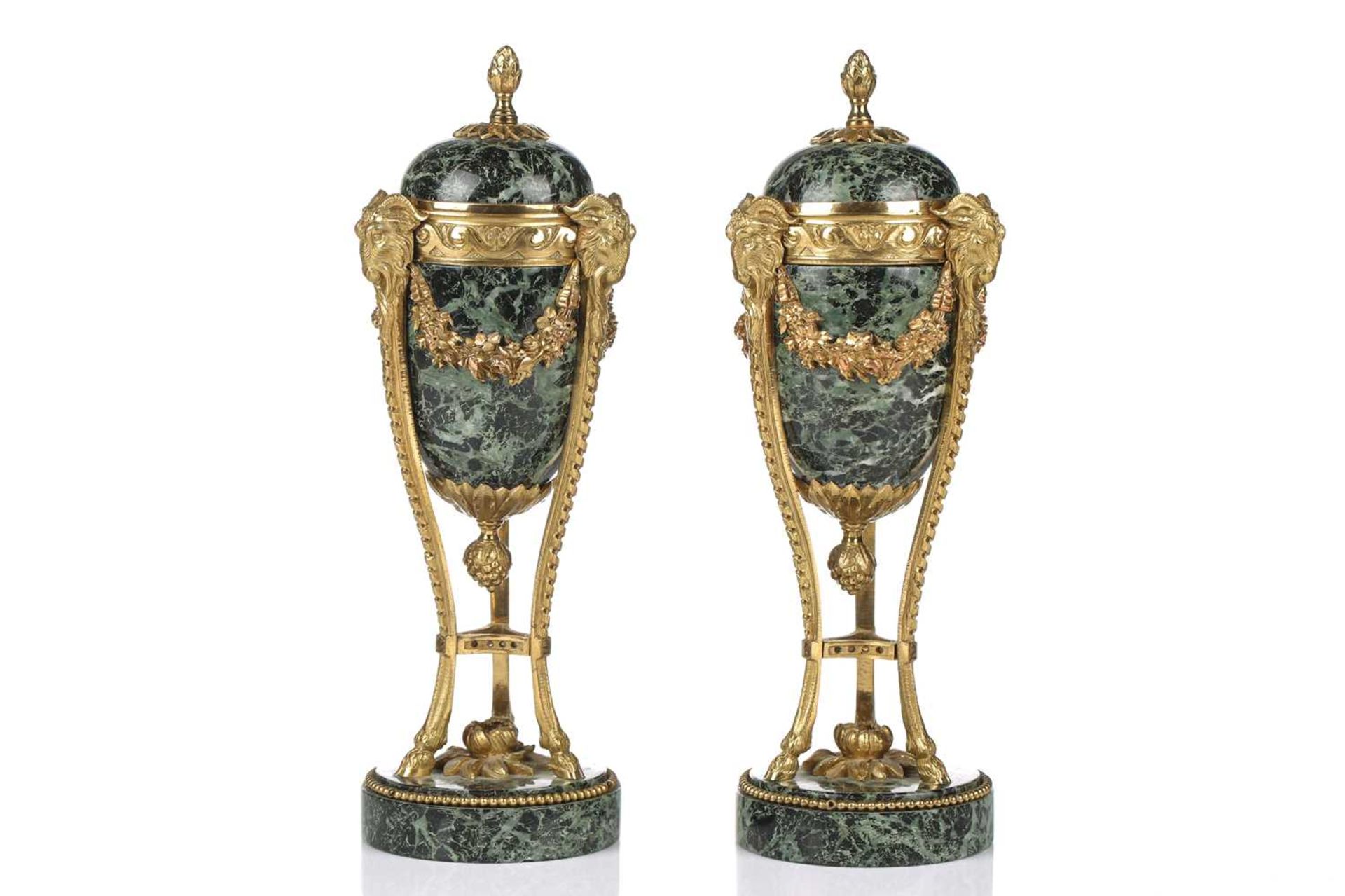 A fine pair of Louis XVI style ormolu and variegated green marble cassolettes of classical urn form,