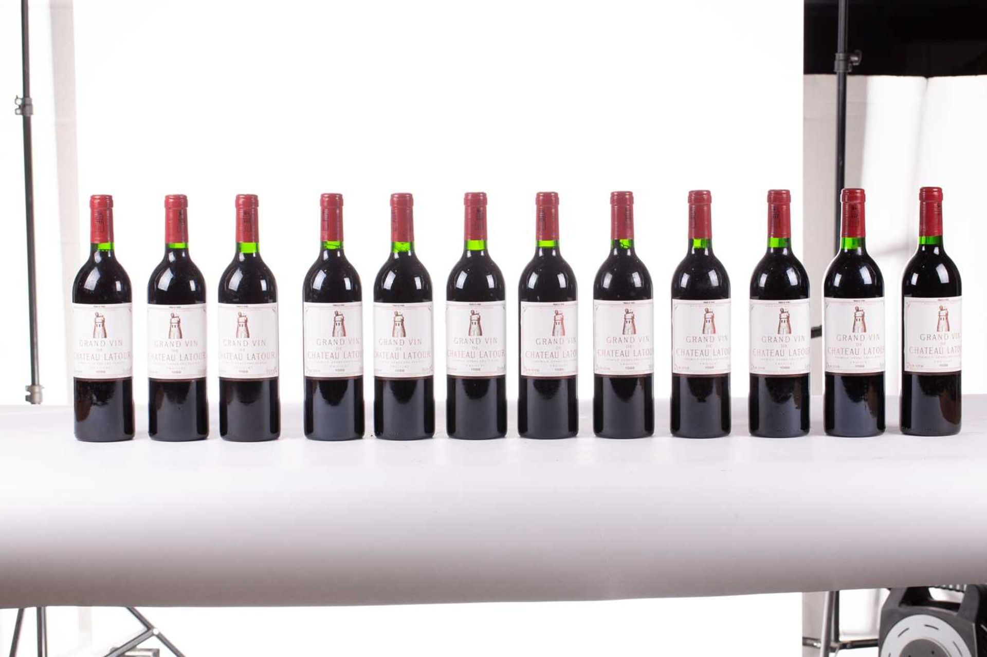 A twelve bottle case of Grand Vin de Chateau Latour, 1988, tissue wrapped bottles, ullage bottom - Image 5 of 21