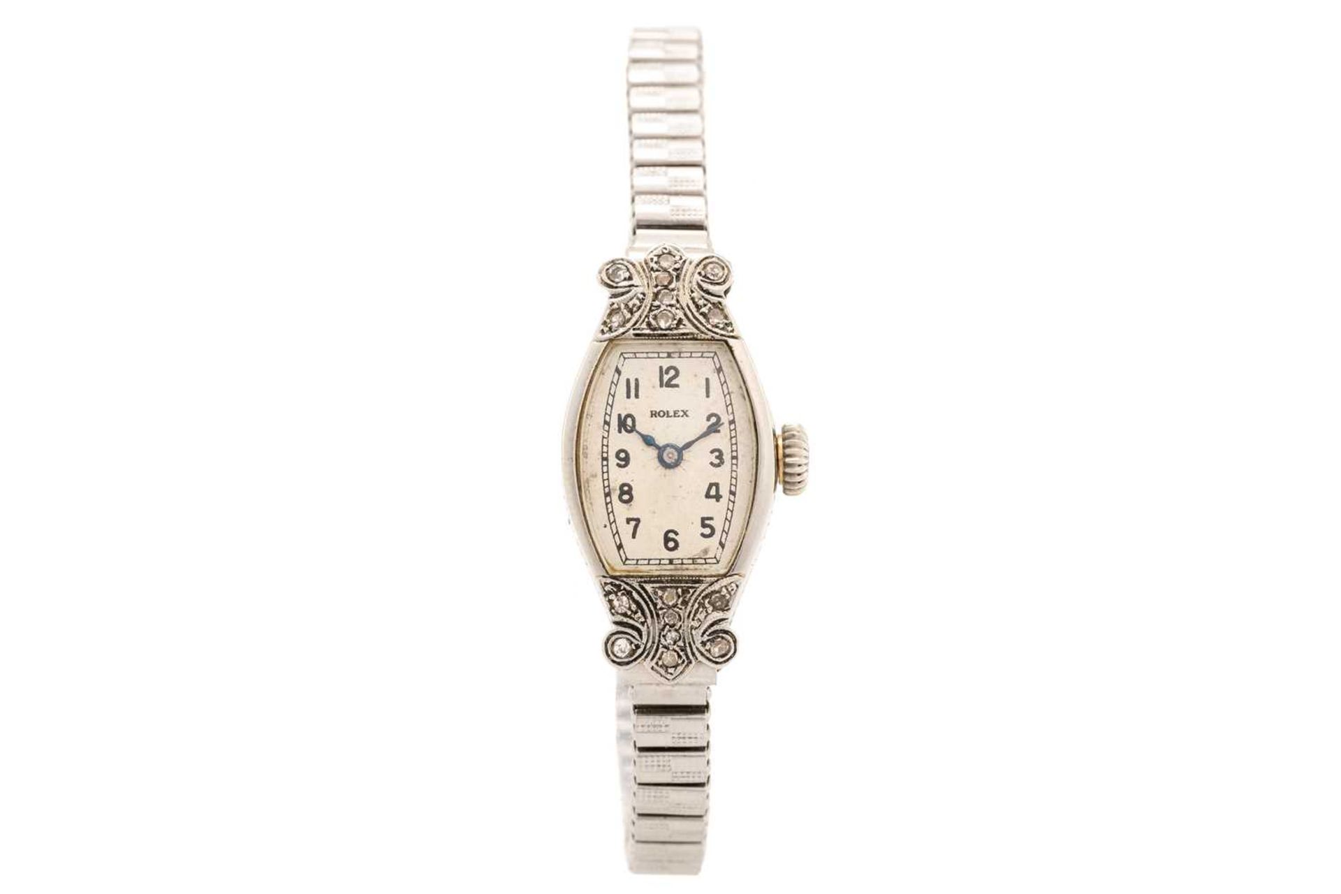 A 1937 Rolex lady's dress watch, featuring a Swiss made hand-wound movement in a white metal tonneau