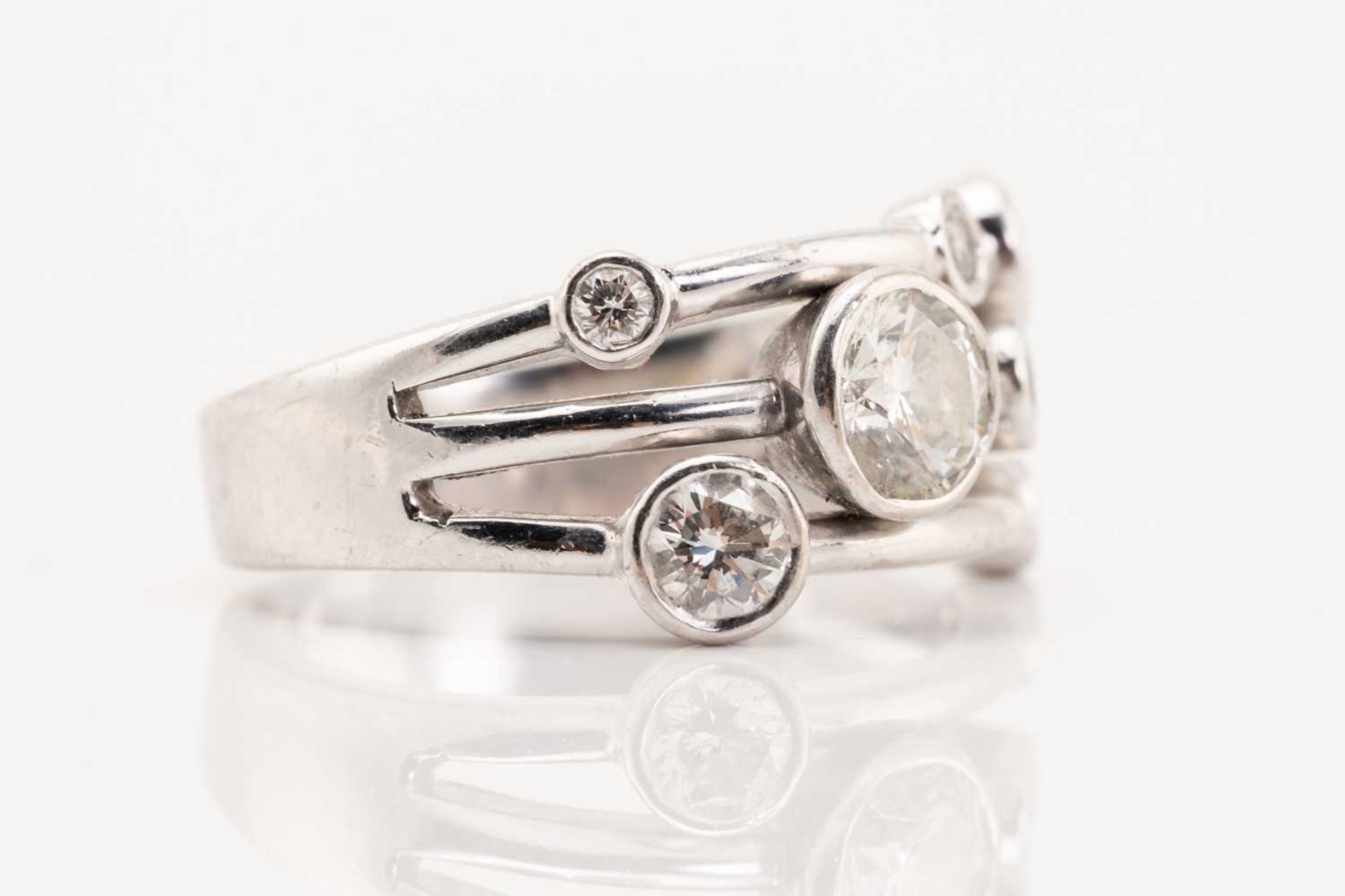 An 18ct gold diamond ring in Raindance-styled design, constructed of three conjoining bands and - Image 5 of 7