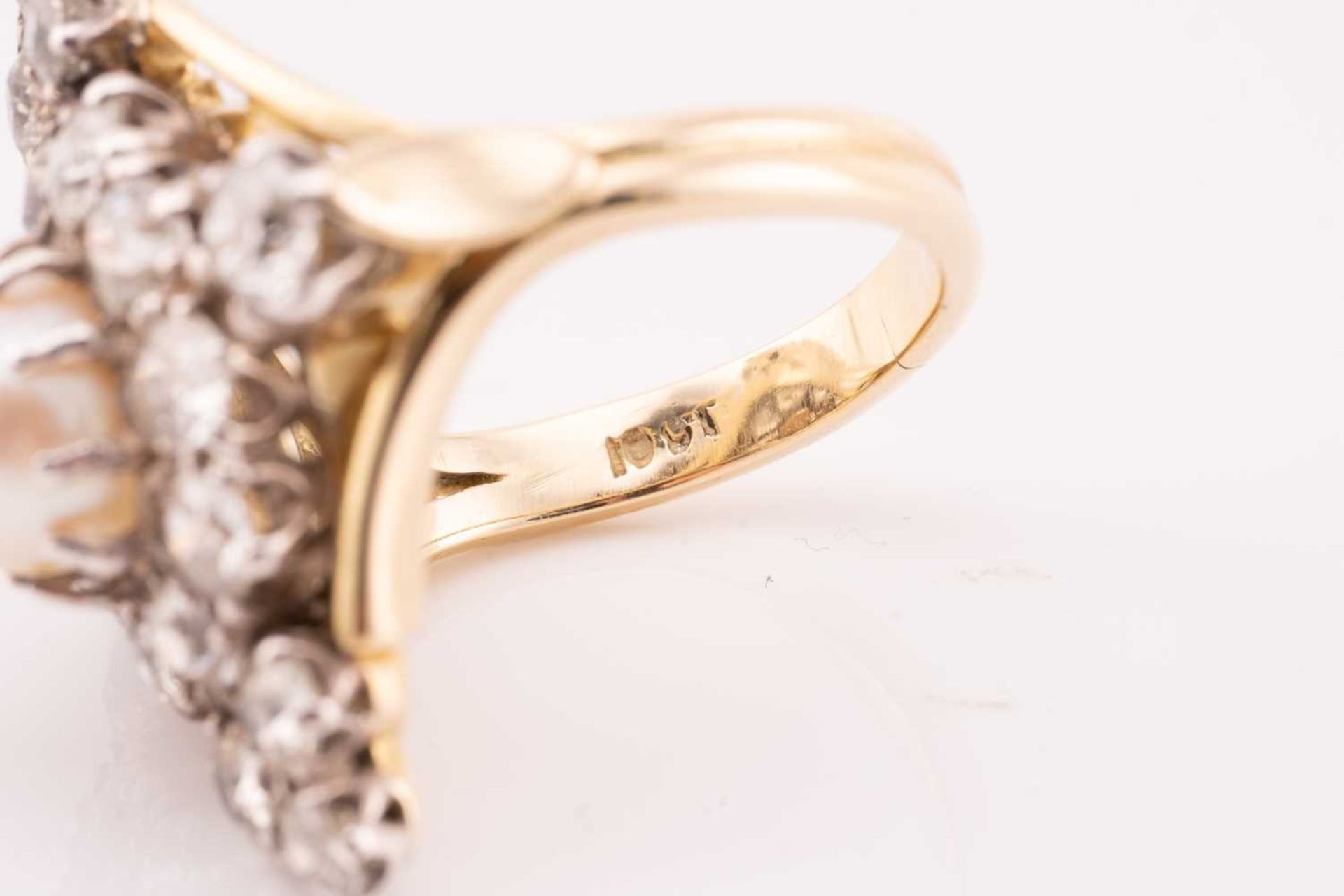 A diamond and pearl cocktail ring, the lozenge panel centred with an off-round pearl of 8.0 mm - Image 4 of 6