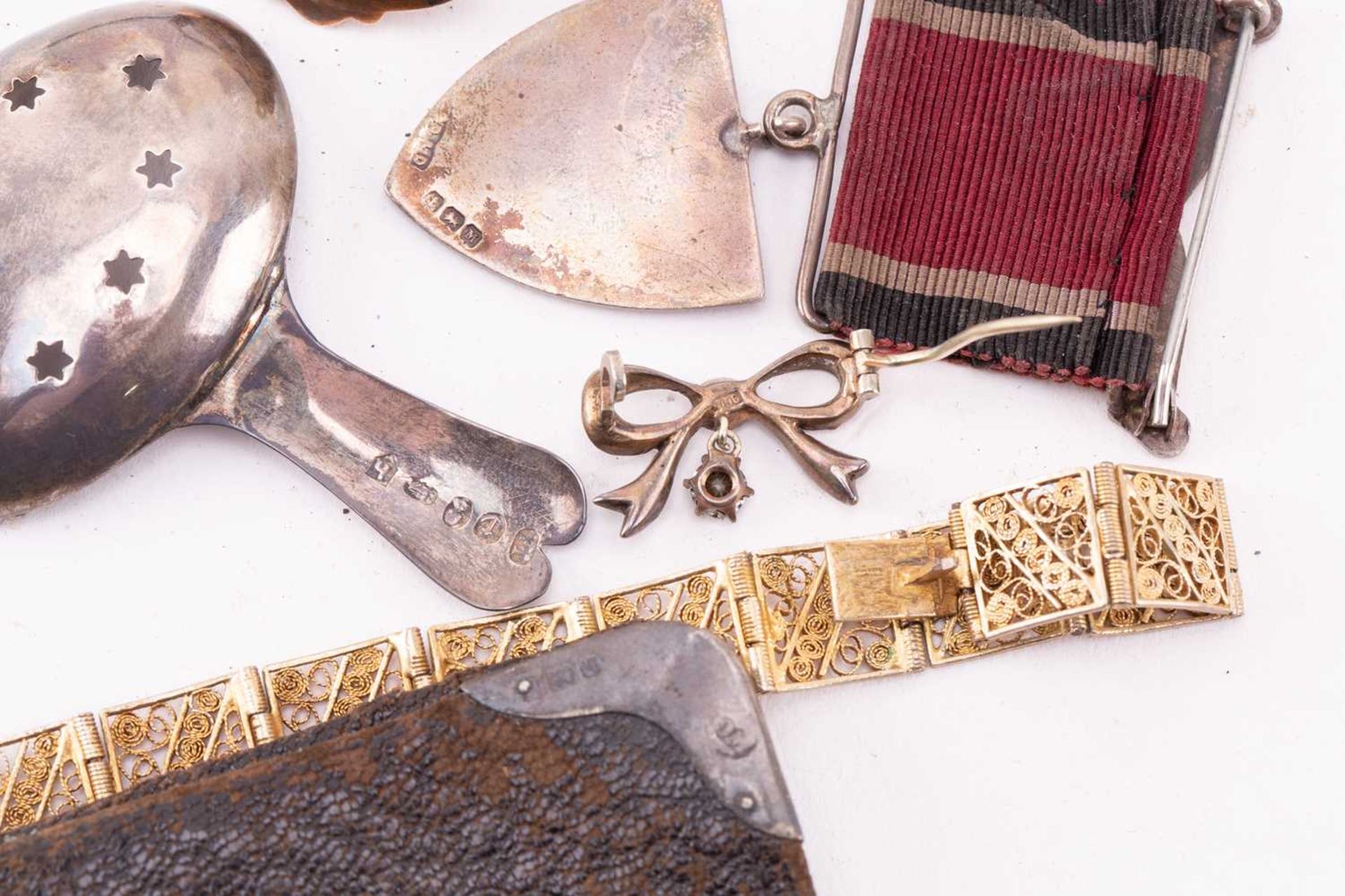 A collection of costume jewellery and other items to include a Scottish brooch set with paste and - Image 7 of 8