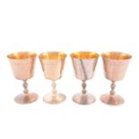 A set of four matched silver wine goblets, London, three 1972 one 1974 by A Haviland-Nye, the