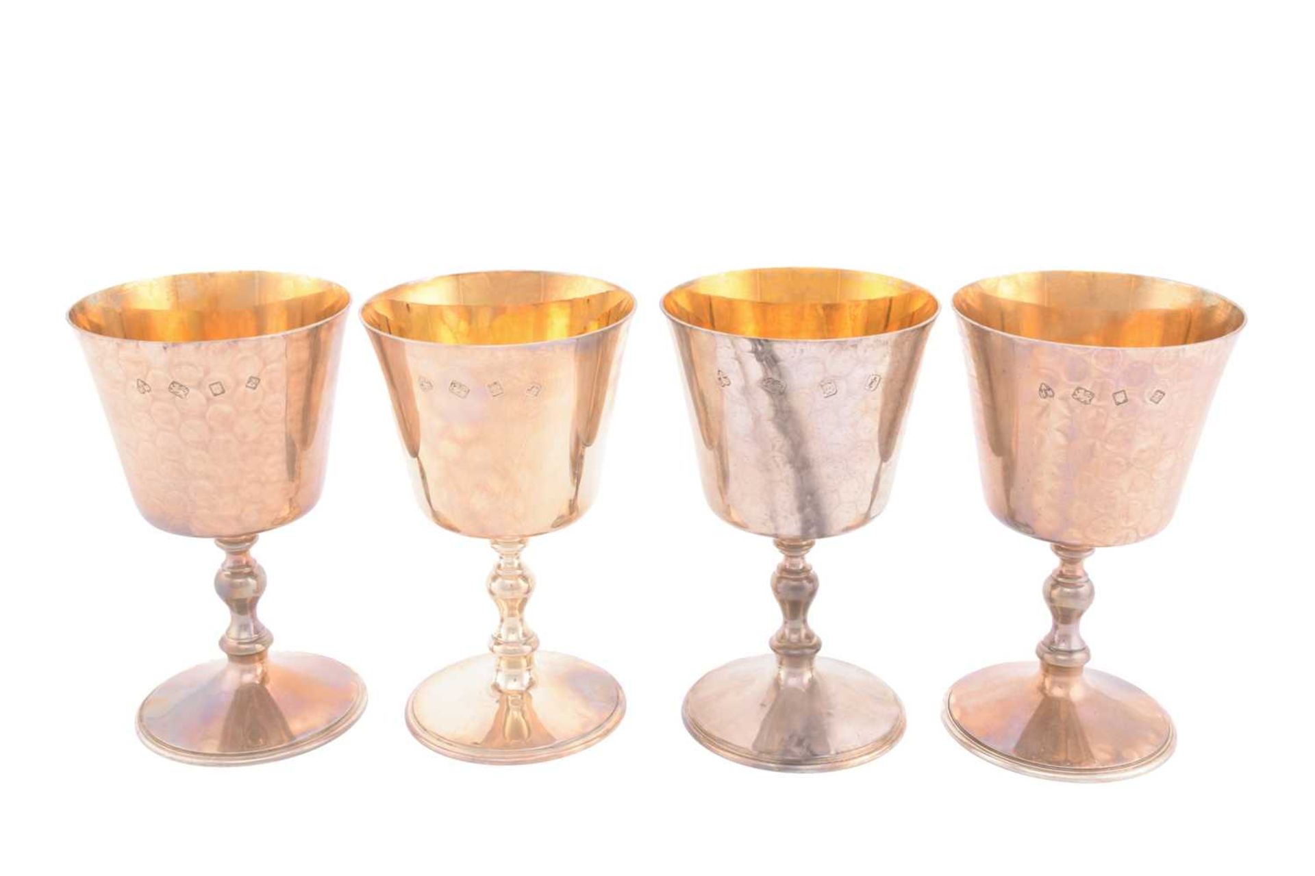 A set of four matched silver wine goblets, London, three 1972 one 1974 by A Haviland-Nye, the