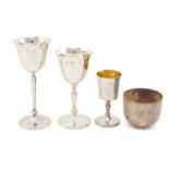 A set of three 20th-century silver wine goblets and a silver tumbler; London hallmarked with A