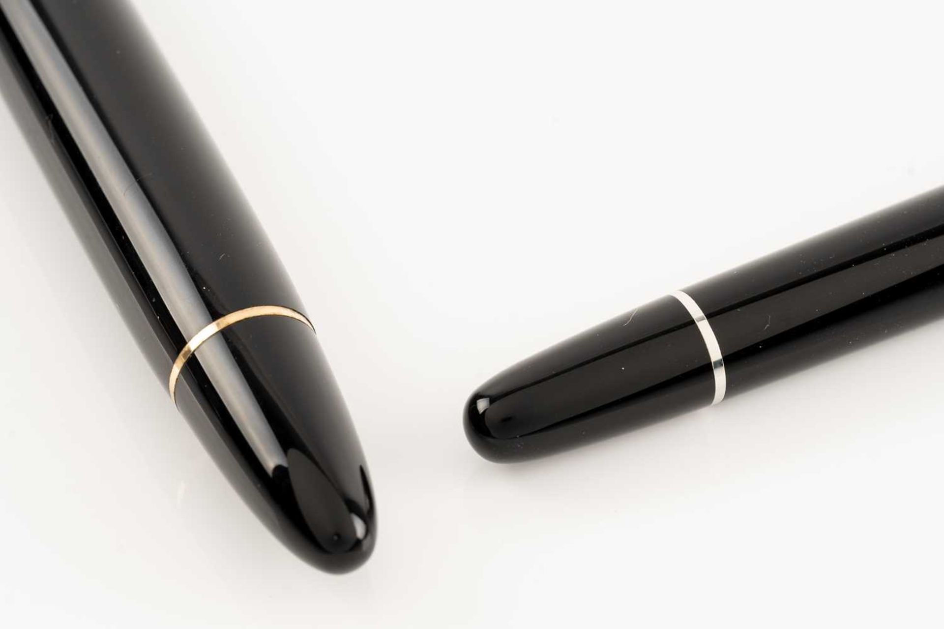 Two Montblanc fountain pens comprising a Montblanc Meisterstück Pix with twist black resin barrel, - Image 6 of 6