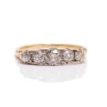 A five-stone diamond half-hoop ring, comprising five graduated old-cut diamonds in mount and