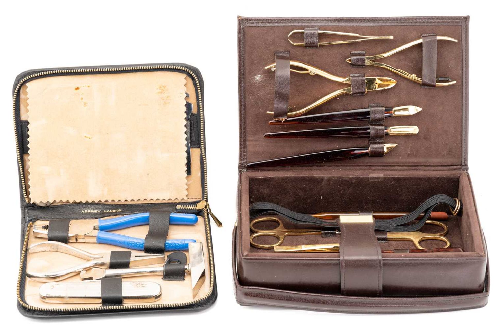 Asprey. A small tool kit in a fitted Asprey leather case together with an Asprey's leather cased