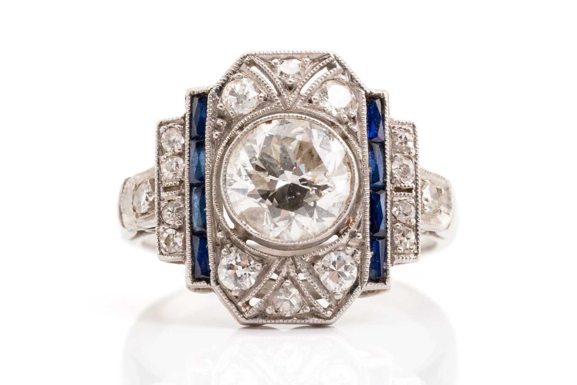 An Art Deco diamond sapphire panel ring, scintillating with an old-European cut diamond of 7.0 x 7.0 - Image 2 of 5