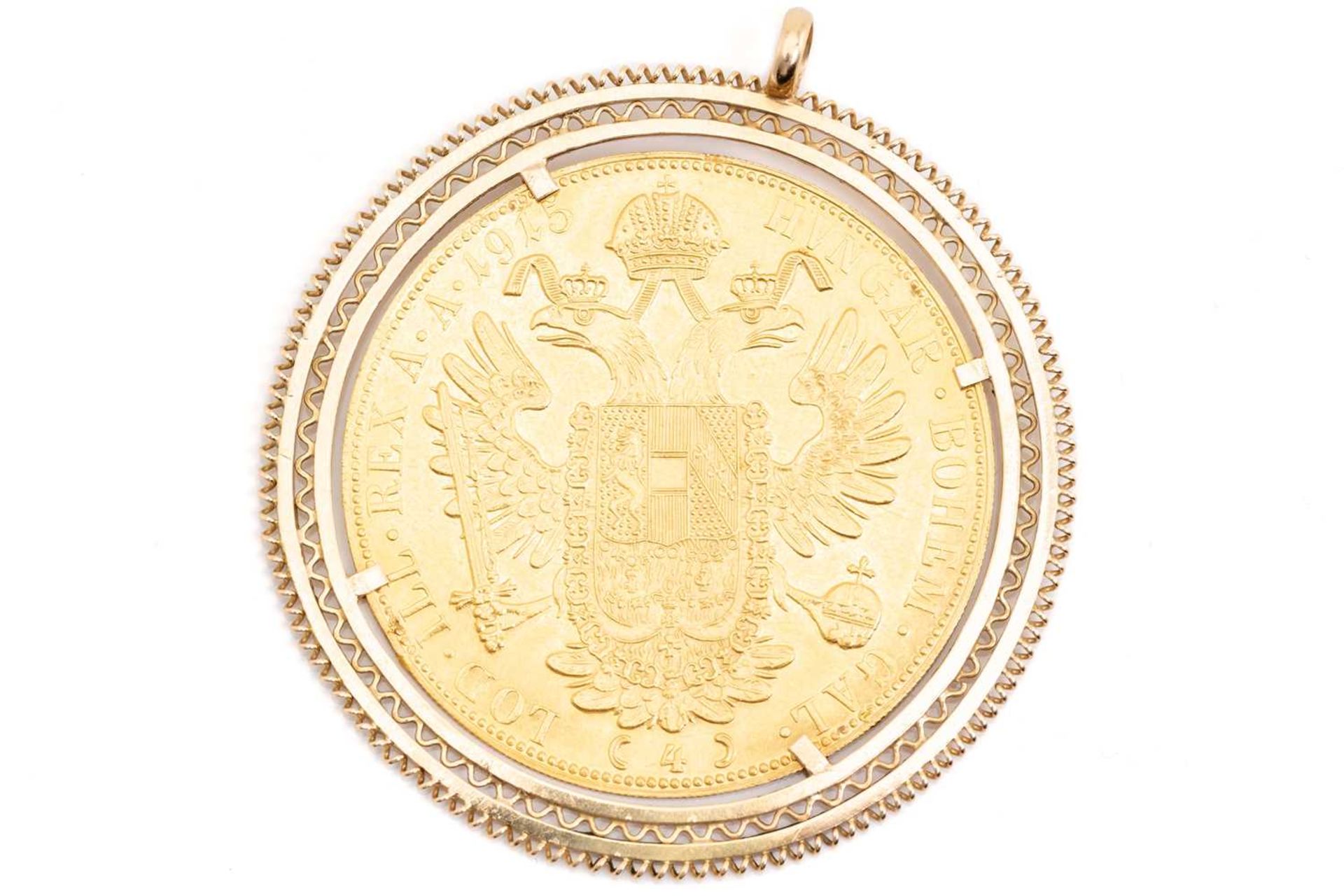 An Austrian four Ducat gold coin, 1915 restrike, in pendant mount with twisted border, to a plain