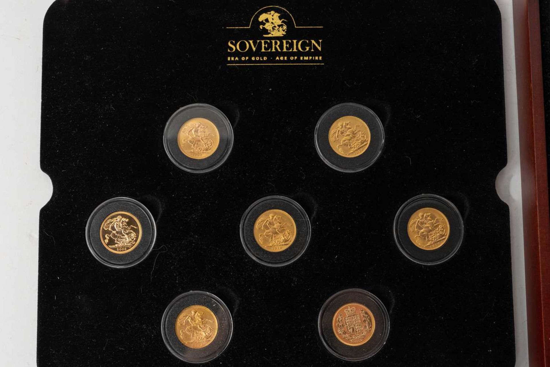 A collection of seven gold sovereigns and a collection of gilt nickel coins, comprising; a Victorian - Image 3 of 4