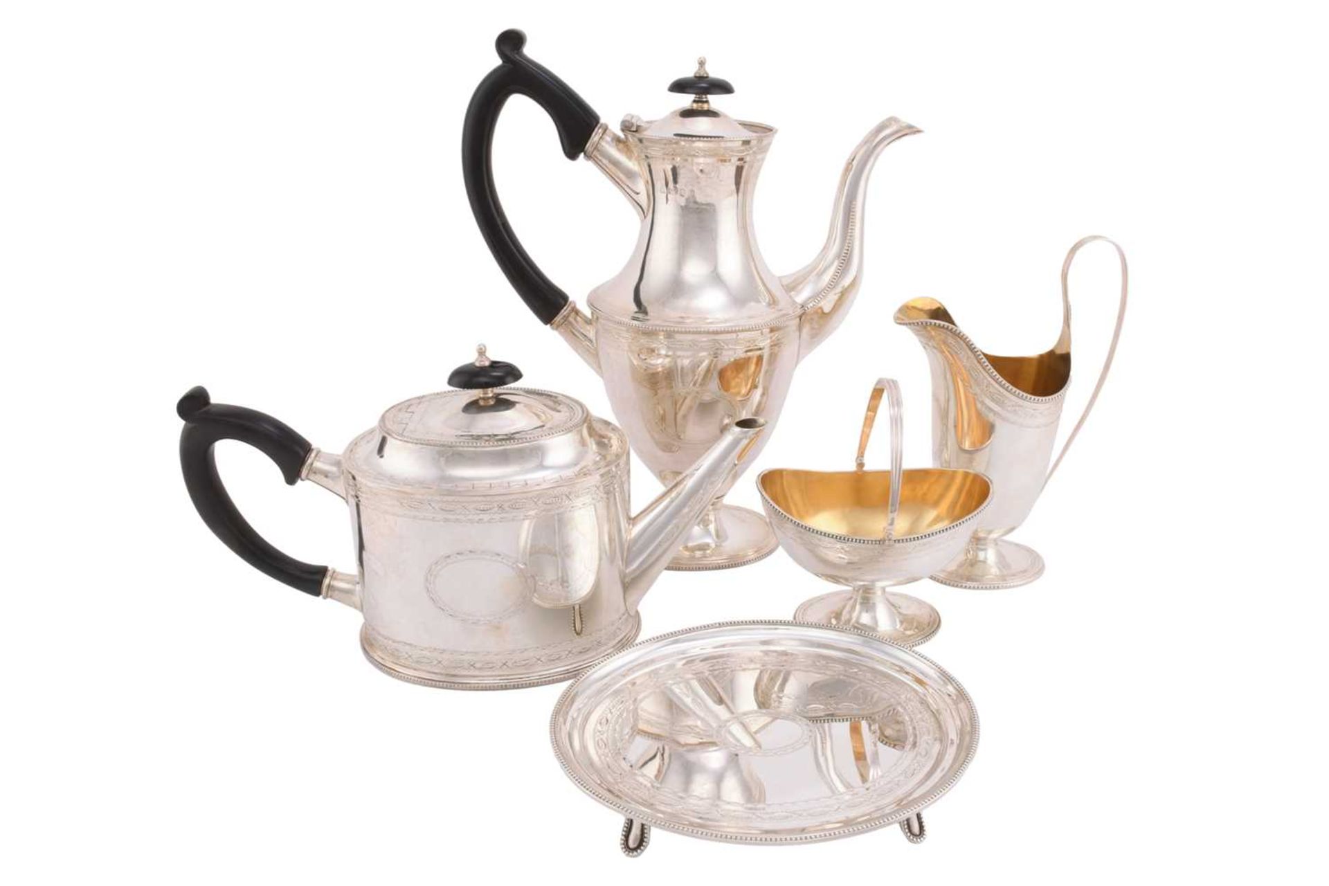 A matched five-piece silver tea set, London 1975/76 by A Haviland-Nye, comprising of a teapot,
