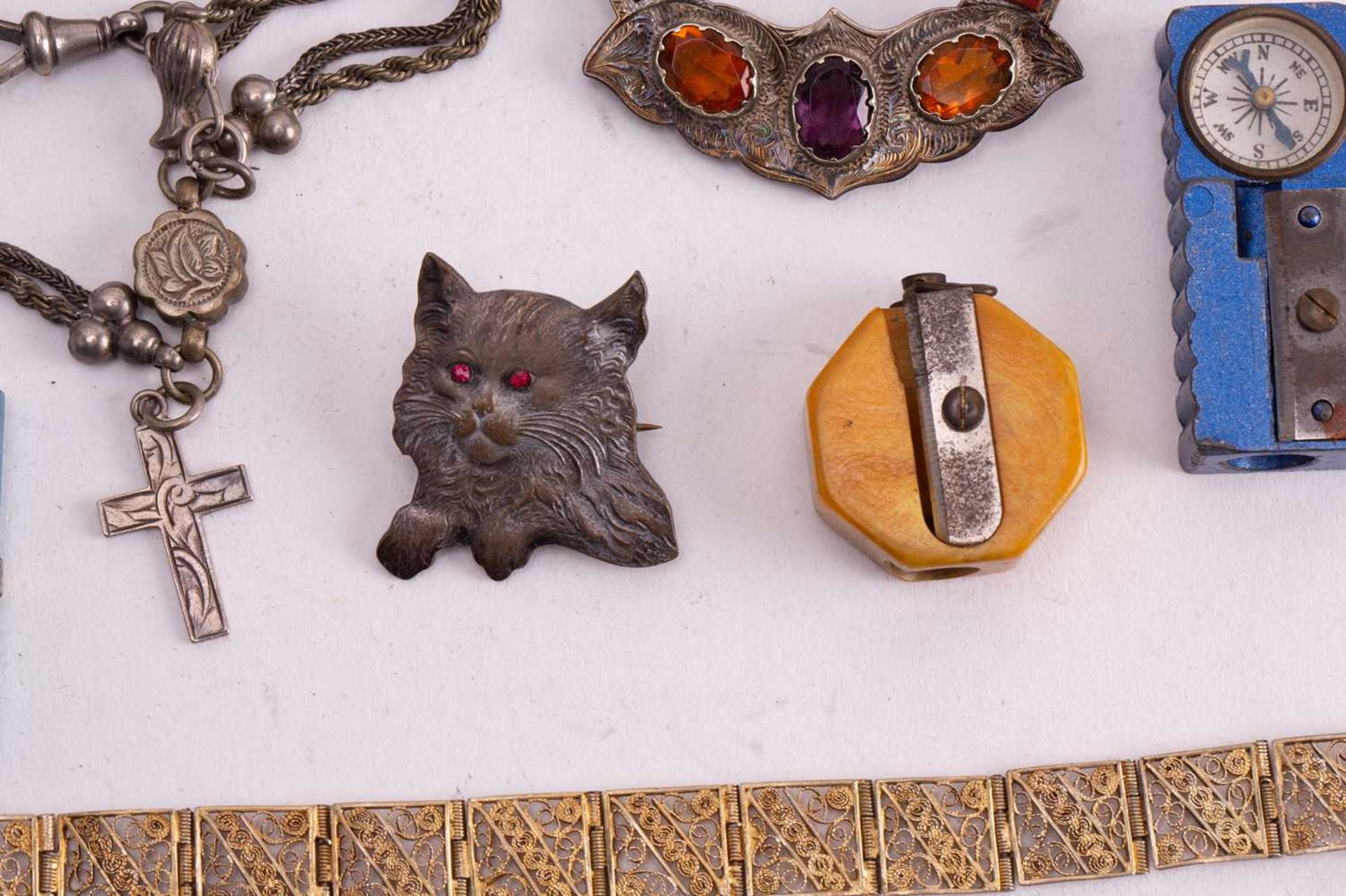 A collection of costume jewellery and other items to include a Scottish brooch set with paste and - Image 4 of 8