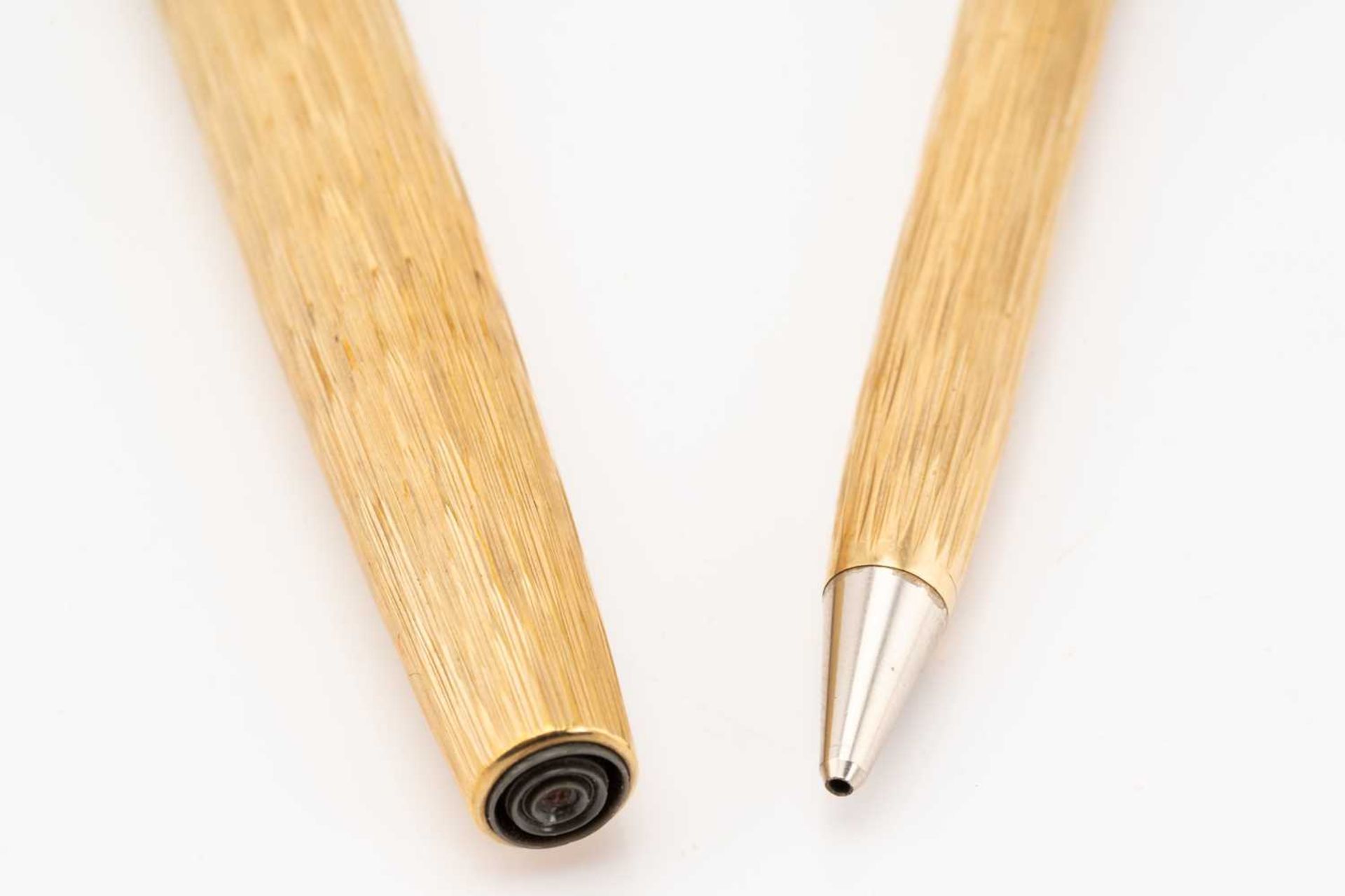 Asprey. A cased 9 carat gold ball point pen and pencil, bark finish engine-turned bodies. The pen - Image 5 of 5