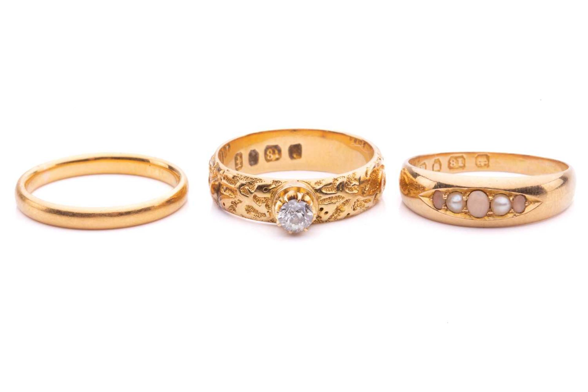 Two Victorian gem-set rings and a 22ct gold wedding band; including an old-cut diamond solitaire