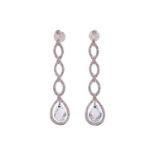 A pair of diamond and aquamarine dangle earrings, each containing a chequerboard-cut aquamarine drop