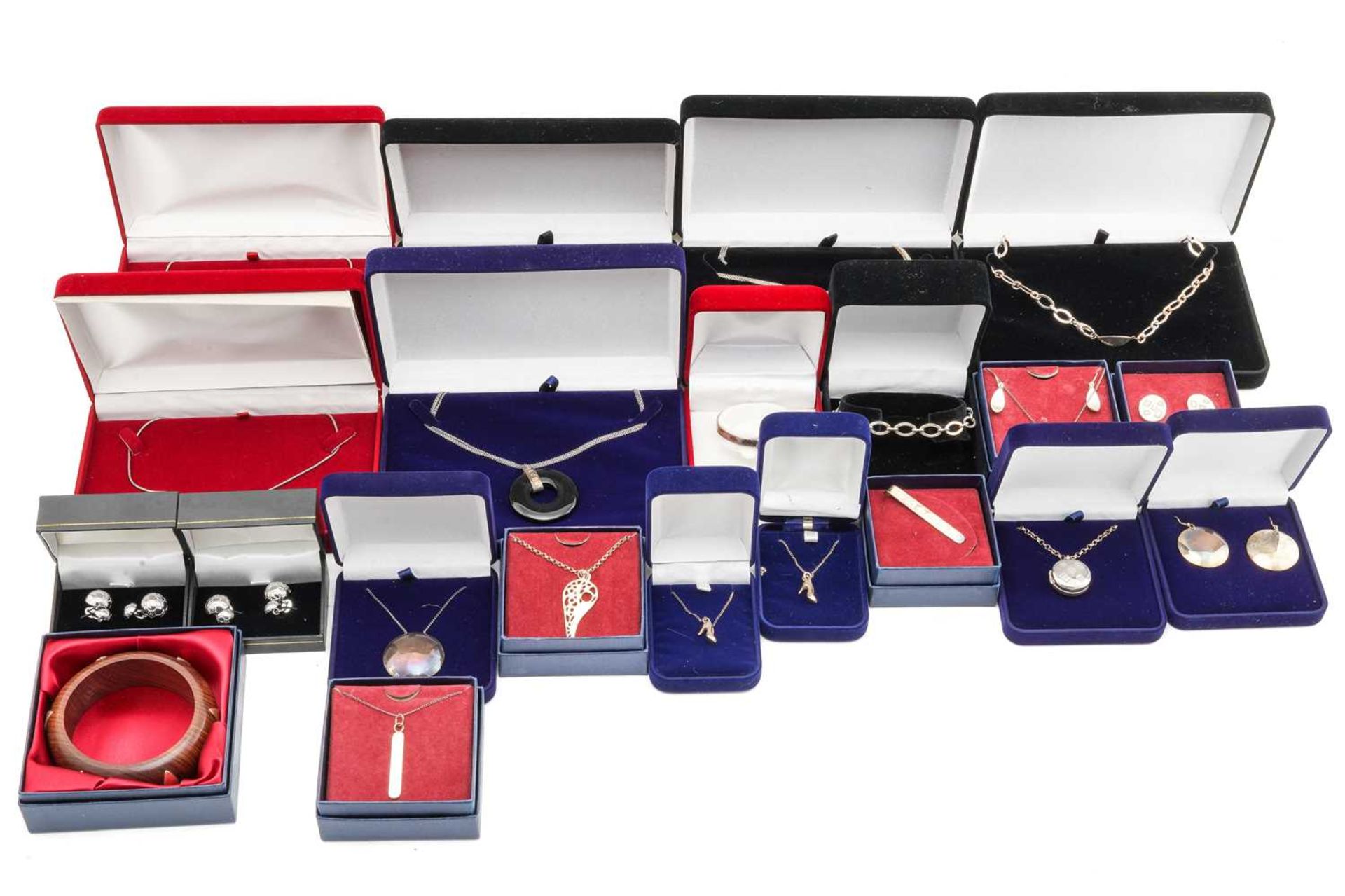 A collection of silver jewellery; including two heart pendants with diamond highlights on chains,