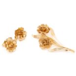 A carnation brooch and earrings en suite by Harry S. Bick & Sons; the brooch of spray design, has