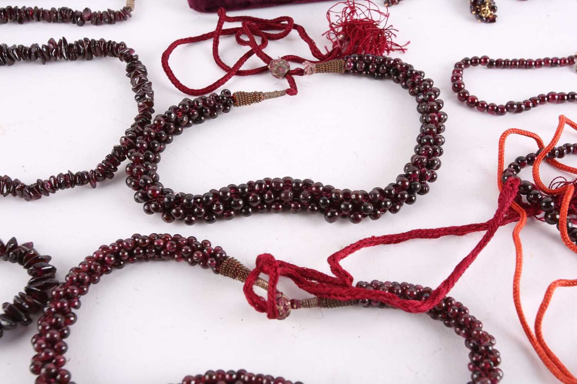 A large collection of garnet beaded jewellery; including four drawstring necklaces with adjustable - Image 4 of 8