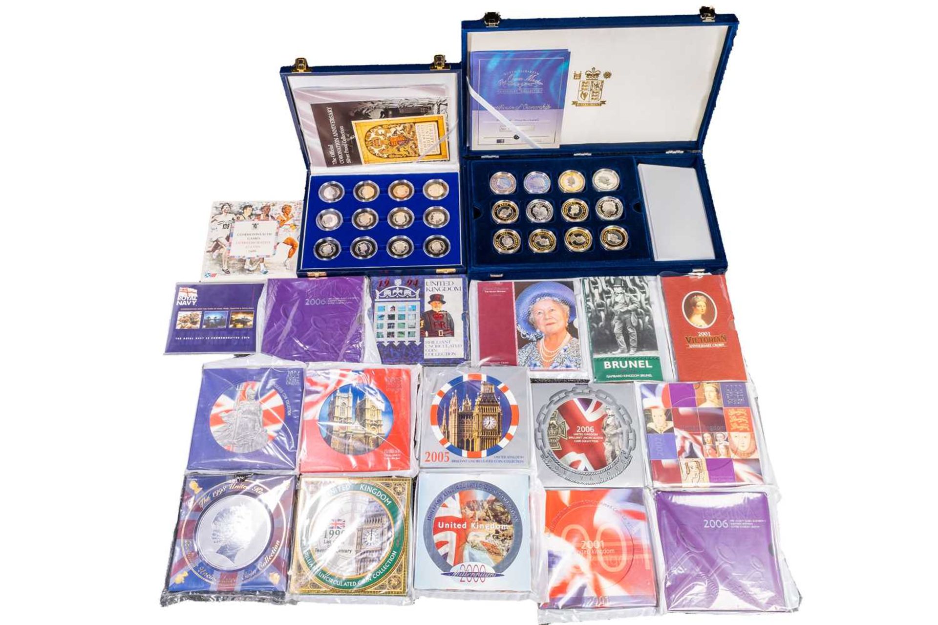 Twelve silver proof 50p sets, set twelve silver proof crowns, eleven annual coin sets and six