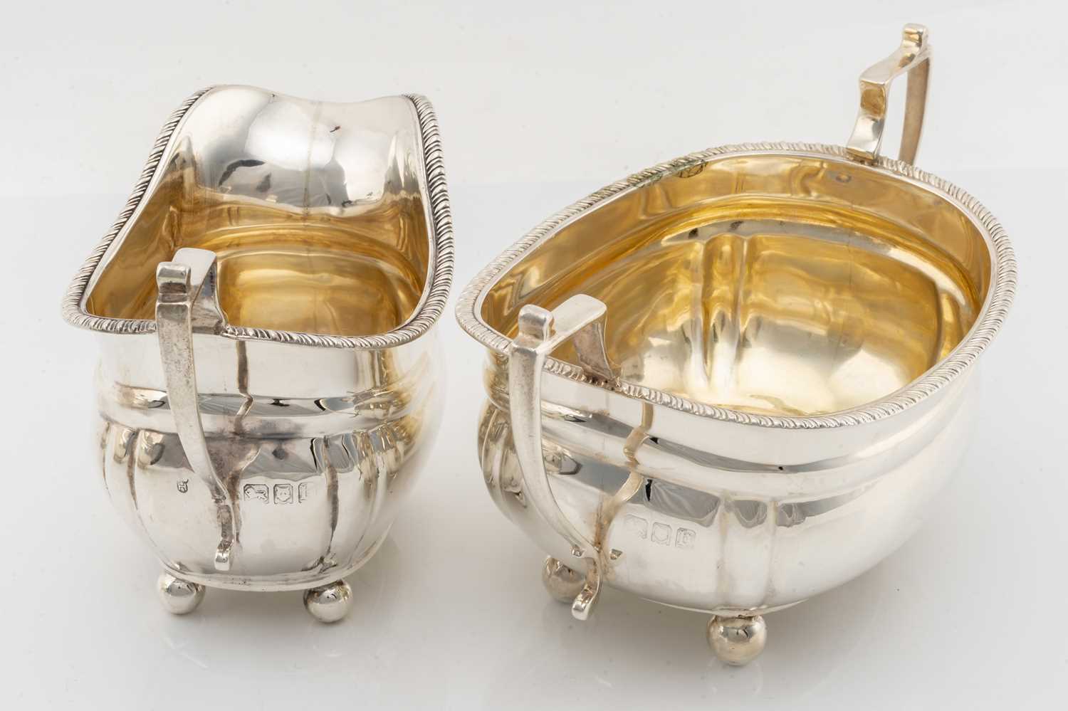 An early 20th-century silver three-piece teaset, London 1917 makers marks indistinct, the oval squat - Image 2 of 4