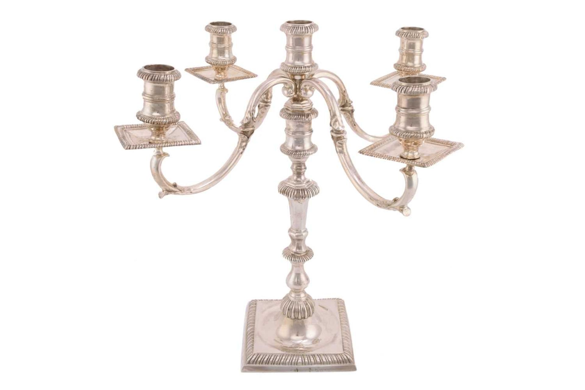 A 20th century silver four branch candelabra, London 1982 by A Haviland-Nye, on a square raised base