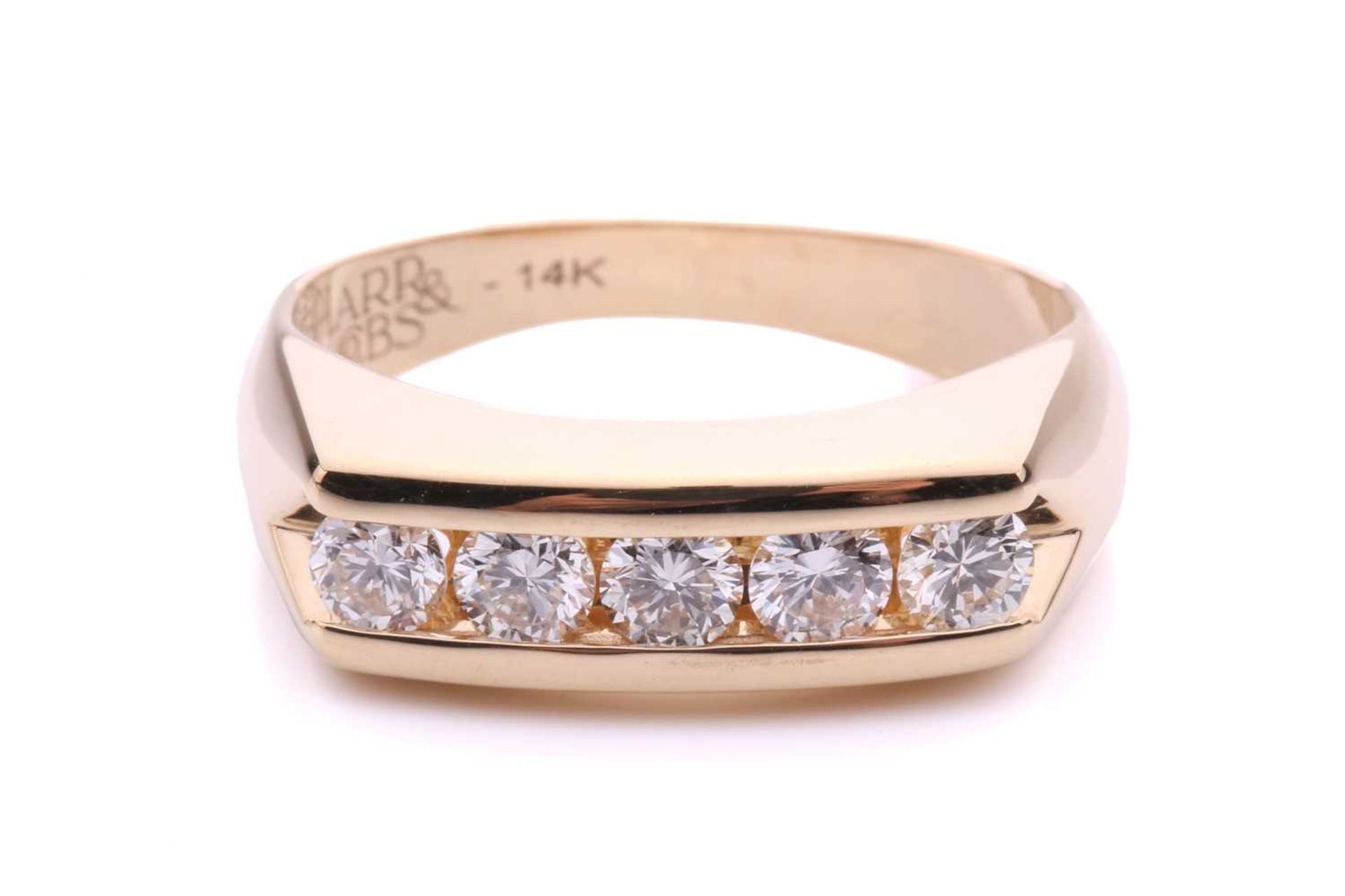 A 5-stone diamond set bar ring, with 5 channel set round brilliant cut diamonds measuring 3.5mm each