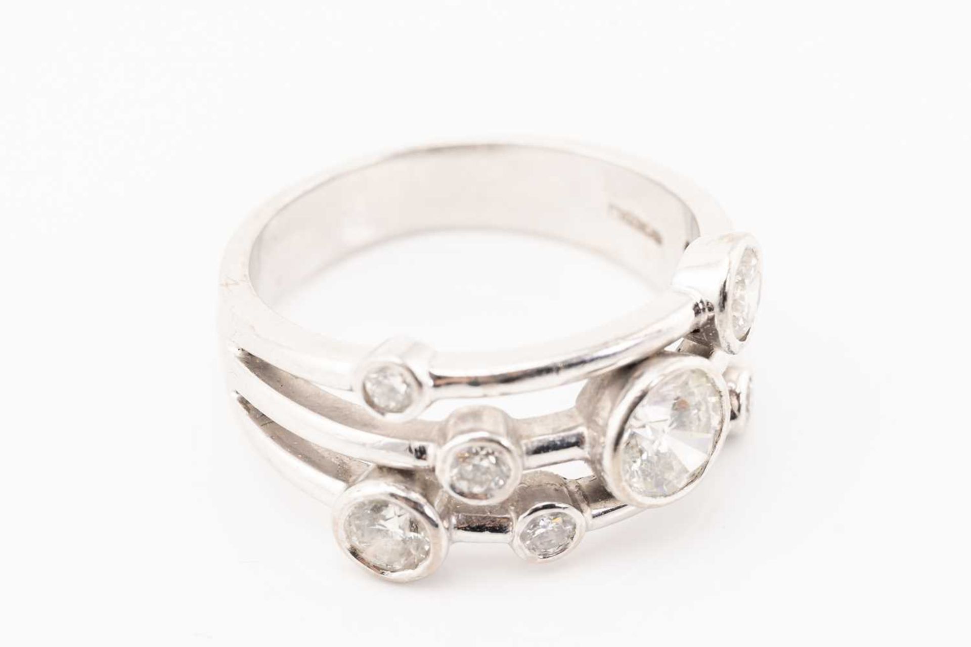 An 18ct gold diamond ring in Raindance-styled design, constructed of three conjoining bands and - Image 2 of 7