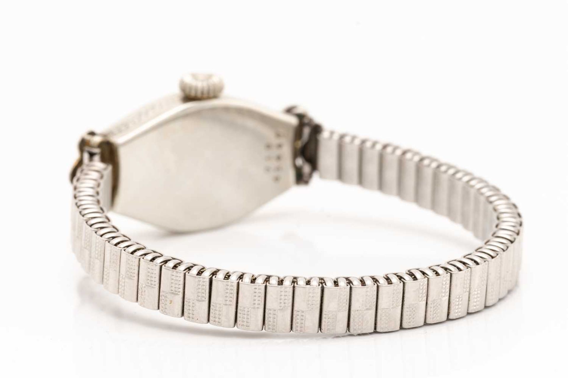 A 1937 Rolex lady's dress watch, featuring a Swiss made hand-wound movement in a white metal tonneau - Image 4 of 5
