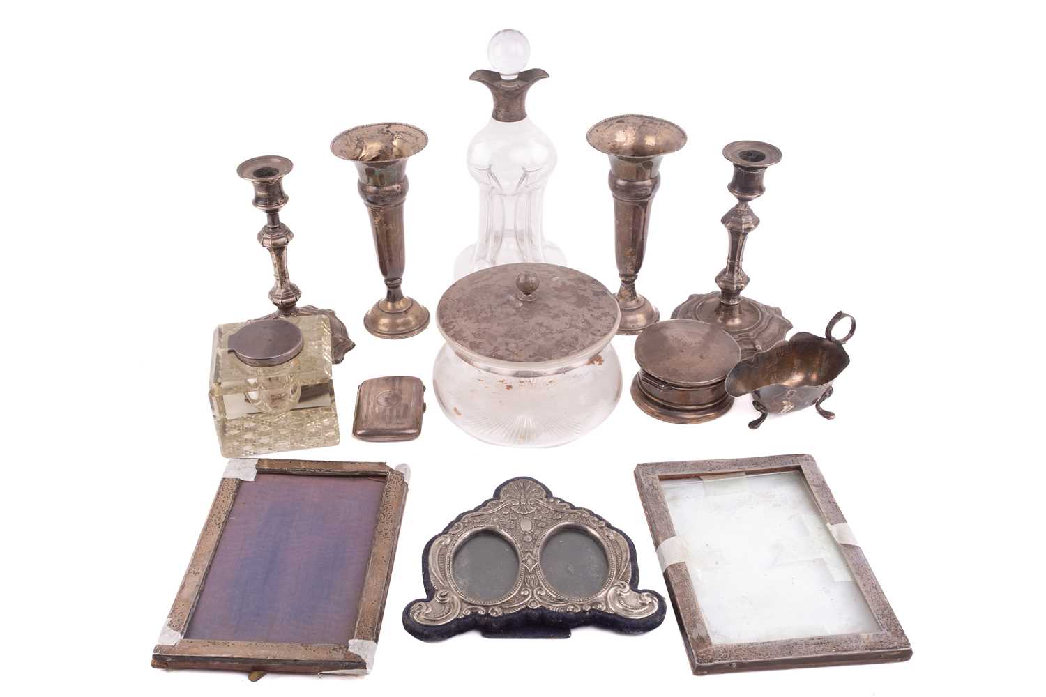 A small collection of silver, comprising a pair of candlesticks with weighted bases, 18.5cm, a - Image 13 of 34