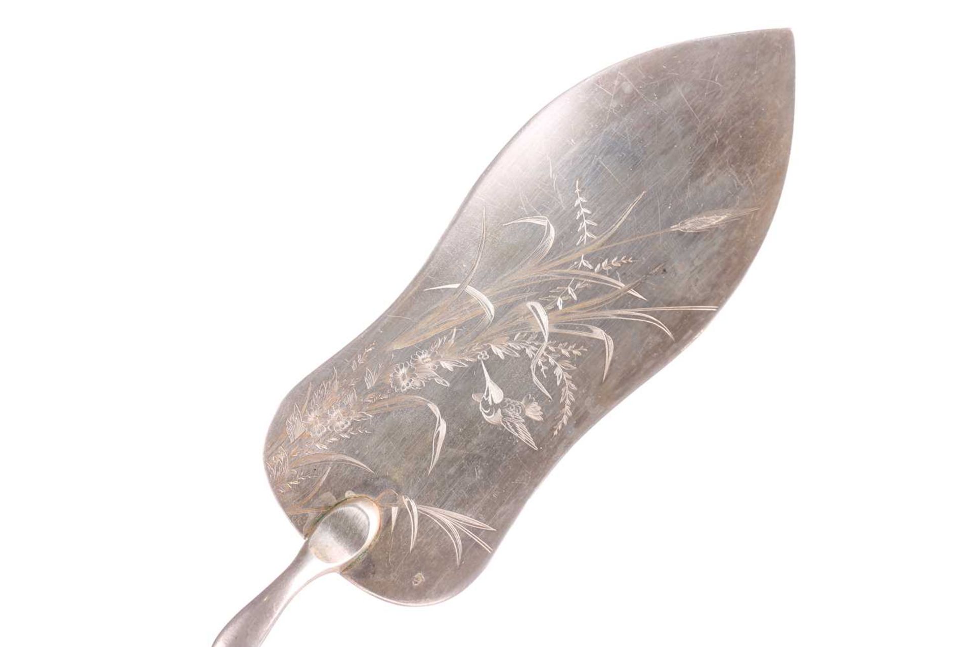 A 19th century French silver cake slice, the shaped blade engraved with a bird amongst foliage, with - Image 4 of 7