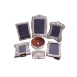 A small collection of silver items, including five silver-mounted picture frames, four of Art Noveau