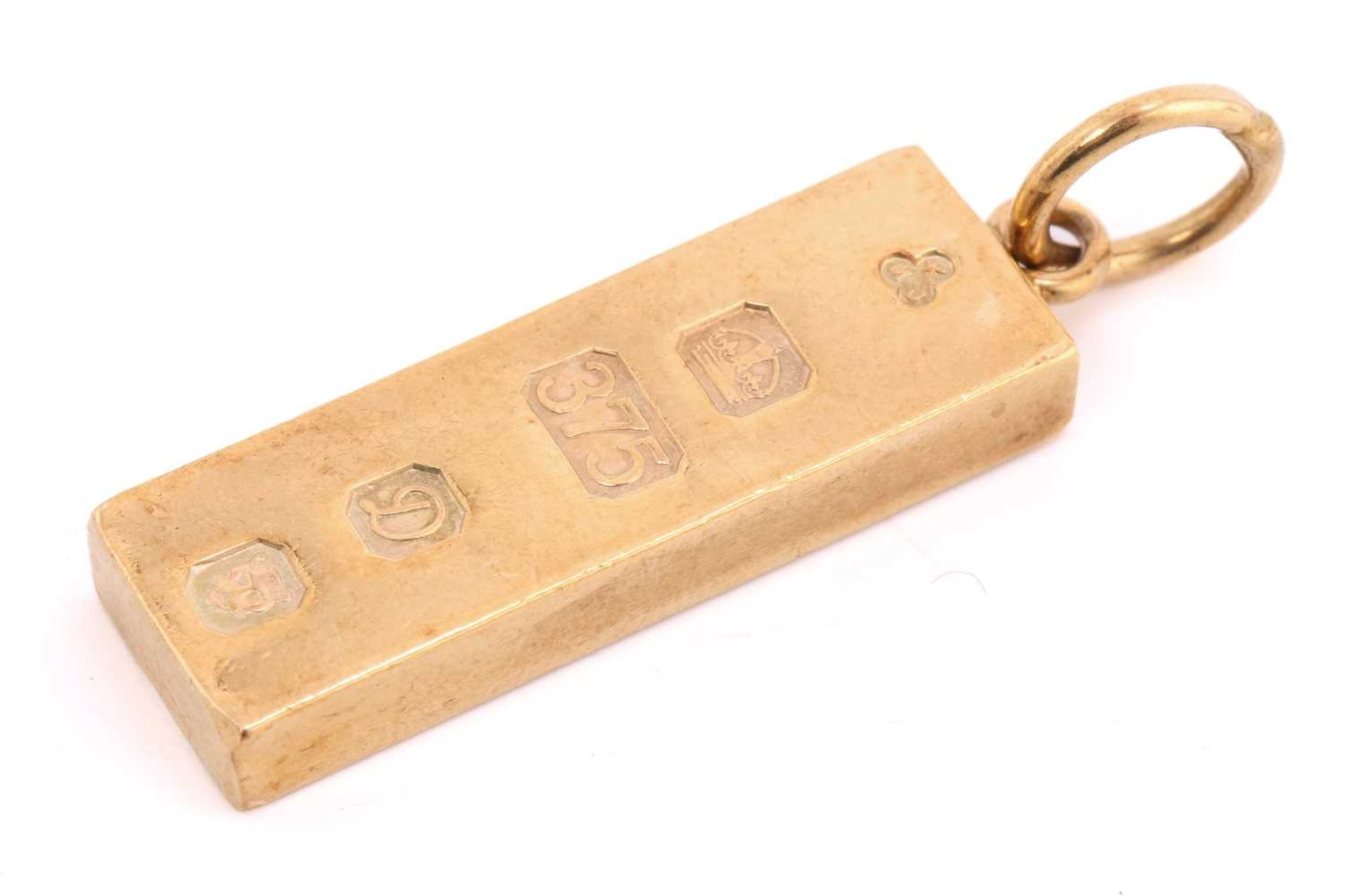 A 9 carat gold ingot pendant; dated 1977. 3.5 cm length; to a jump ring clasp. 20.68 grams - Image 3 of 3