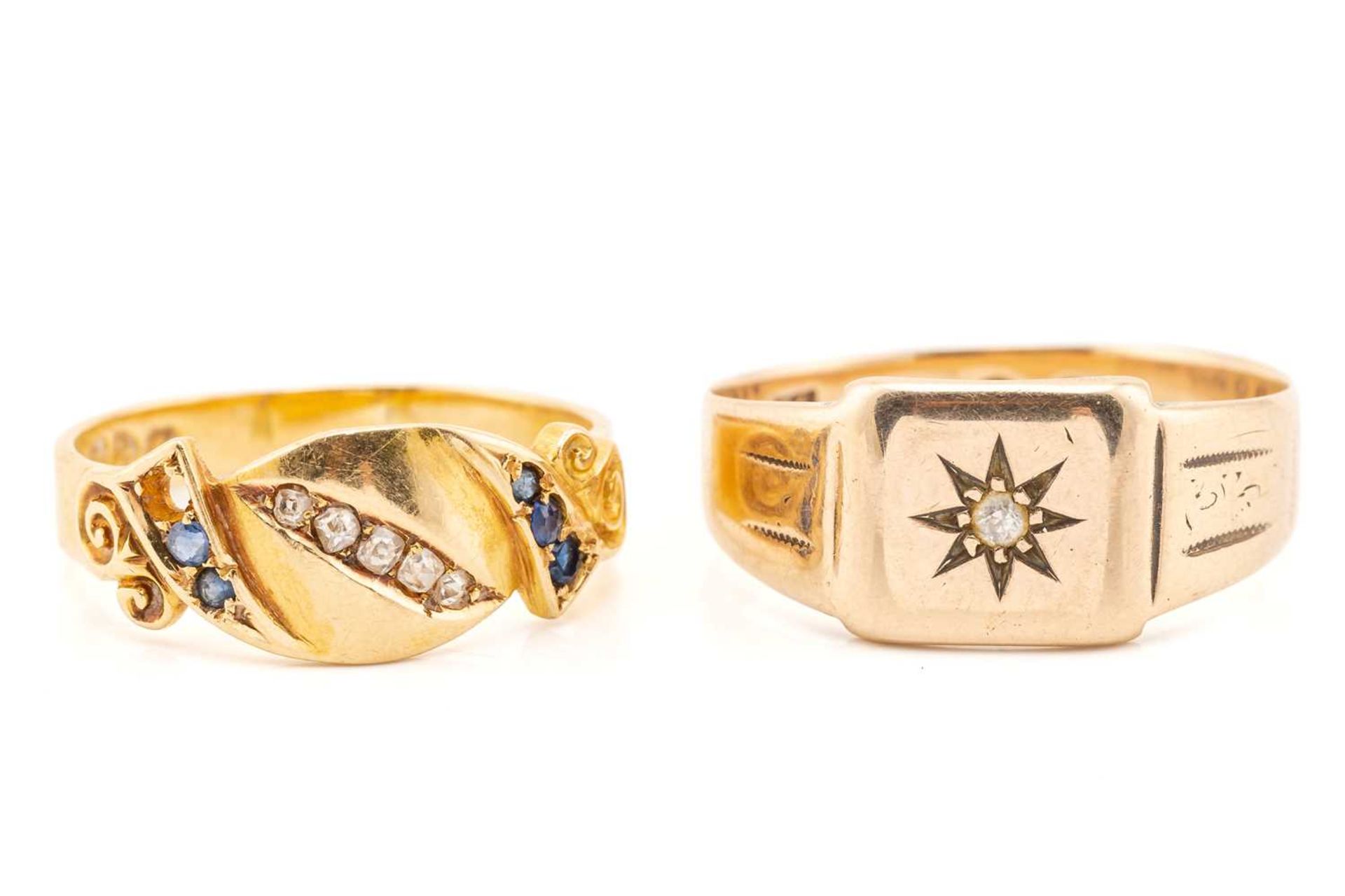 An Edwardian gem-set dress ring in 18ct gold and a diamond-set signet ring; the first ring comprises