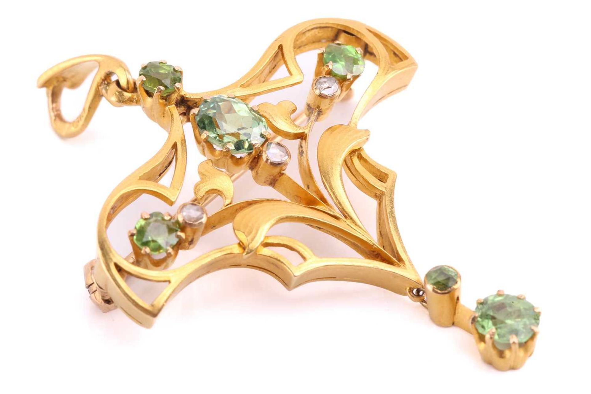 An early 20th-century Russian pendant brooch set with diamonds and demantoid garnets, of floral - Image 3 of 3