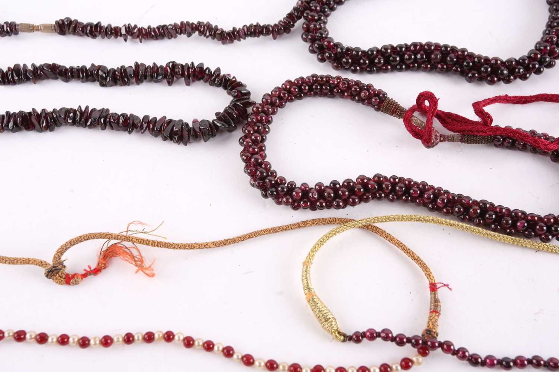 A large collection of garnet beaded jewellery; including four drawstring necklaces with adjustable - Image 6 of 8