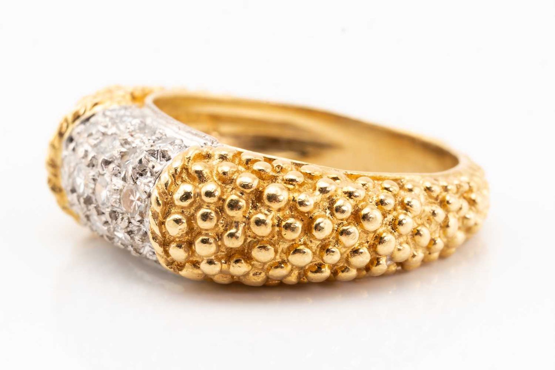 An 18 carat gold and diamond ring saddle ring; the curved centre panel pavé set with brilliant cut - Image 3 of 5