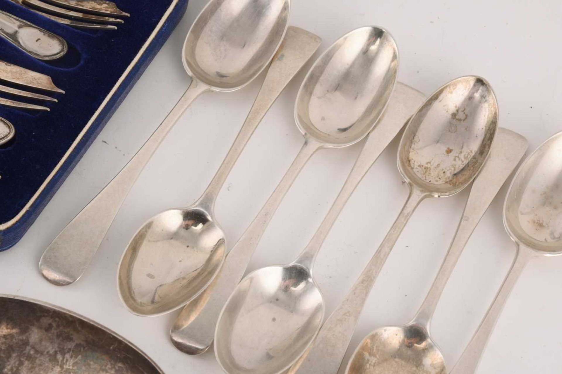 A collection of mixed assayed silver flatware, comprising a large basting spoon, two serving spoons, - Image 7 of 7