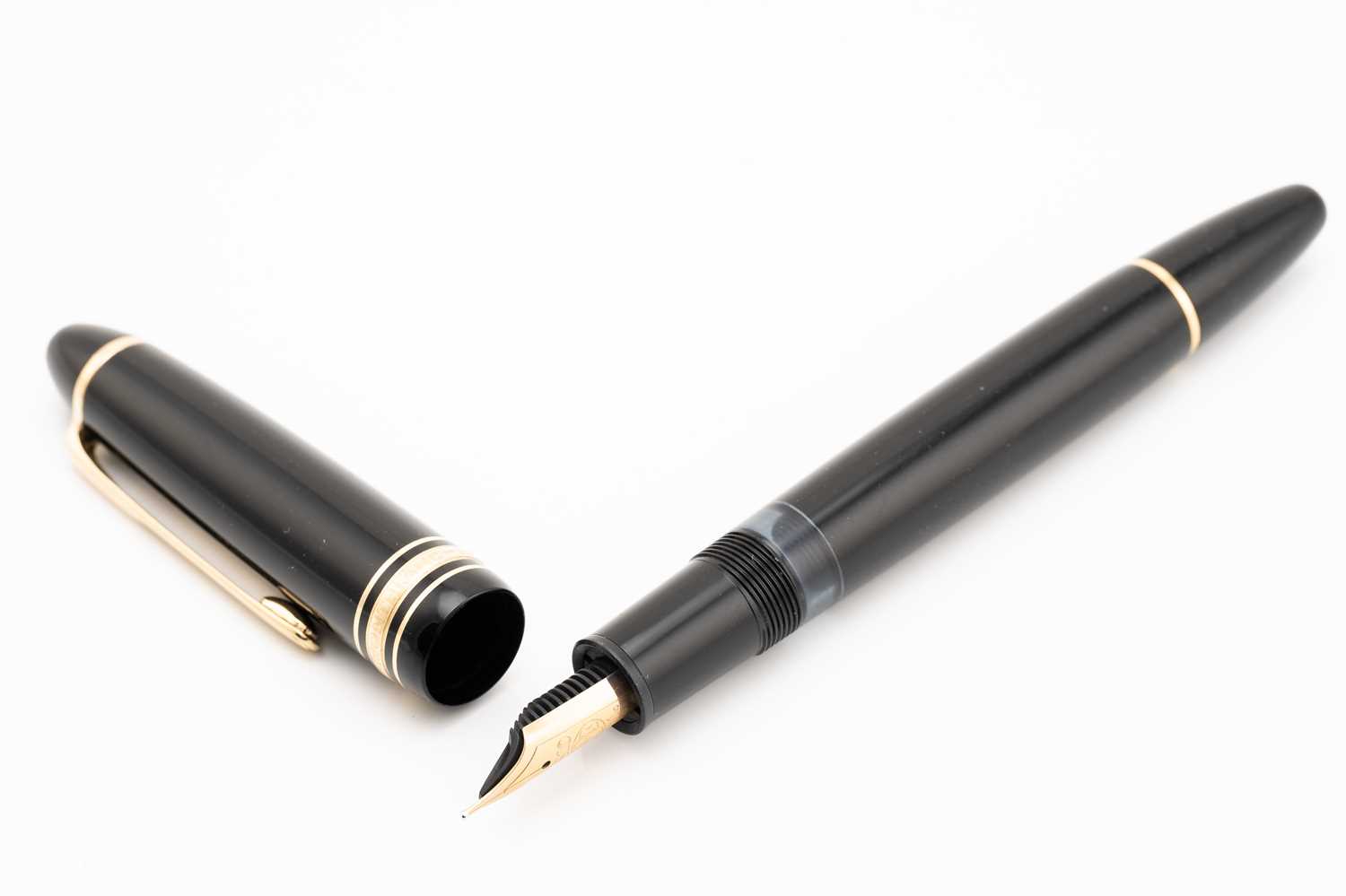 A Mont Blanc Meisterstück 146 fountain pen, with twist black resin barrel, gold-tone hardware, and - Image 2 of 5