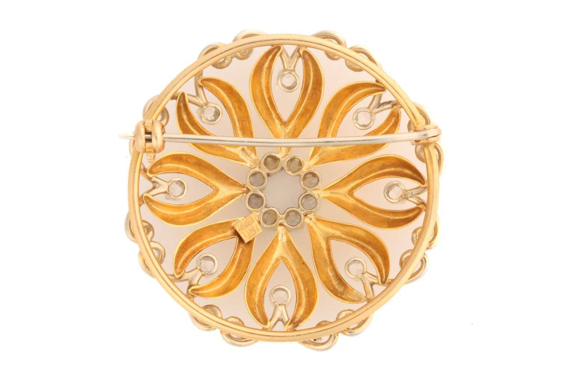 A continental scrollwork brooch embellished with white stones, the domed openwork mount has fitted - Bild 2 aus 4