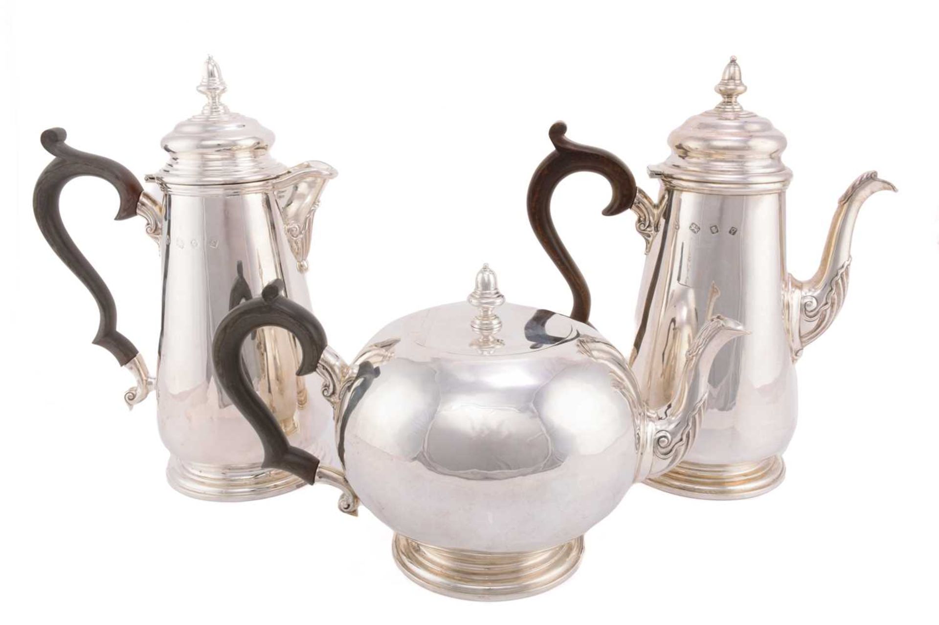 A matched three piece silver tea set, London 1971, 1981, and 1983 by A Haviland-Nye, comprising of a