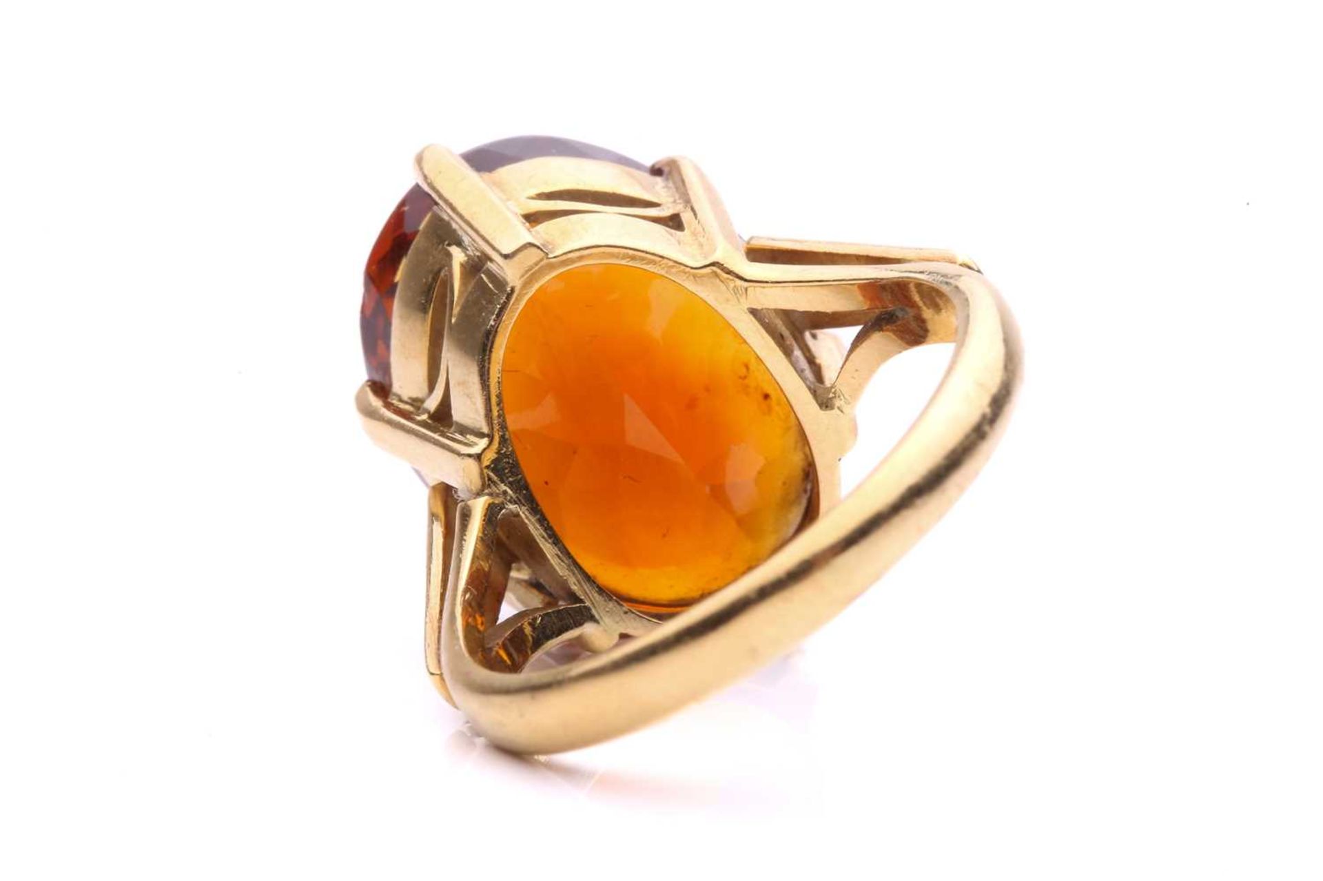 A large citrine cocktail ring, consisting of an oval-cut citrine with a brownish-orange body colour, - Image 4 of 5