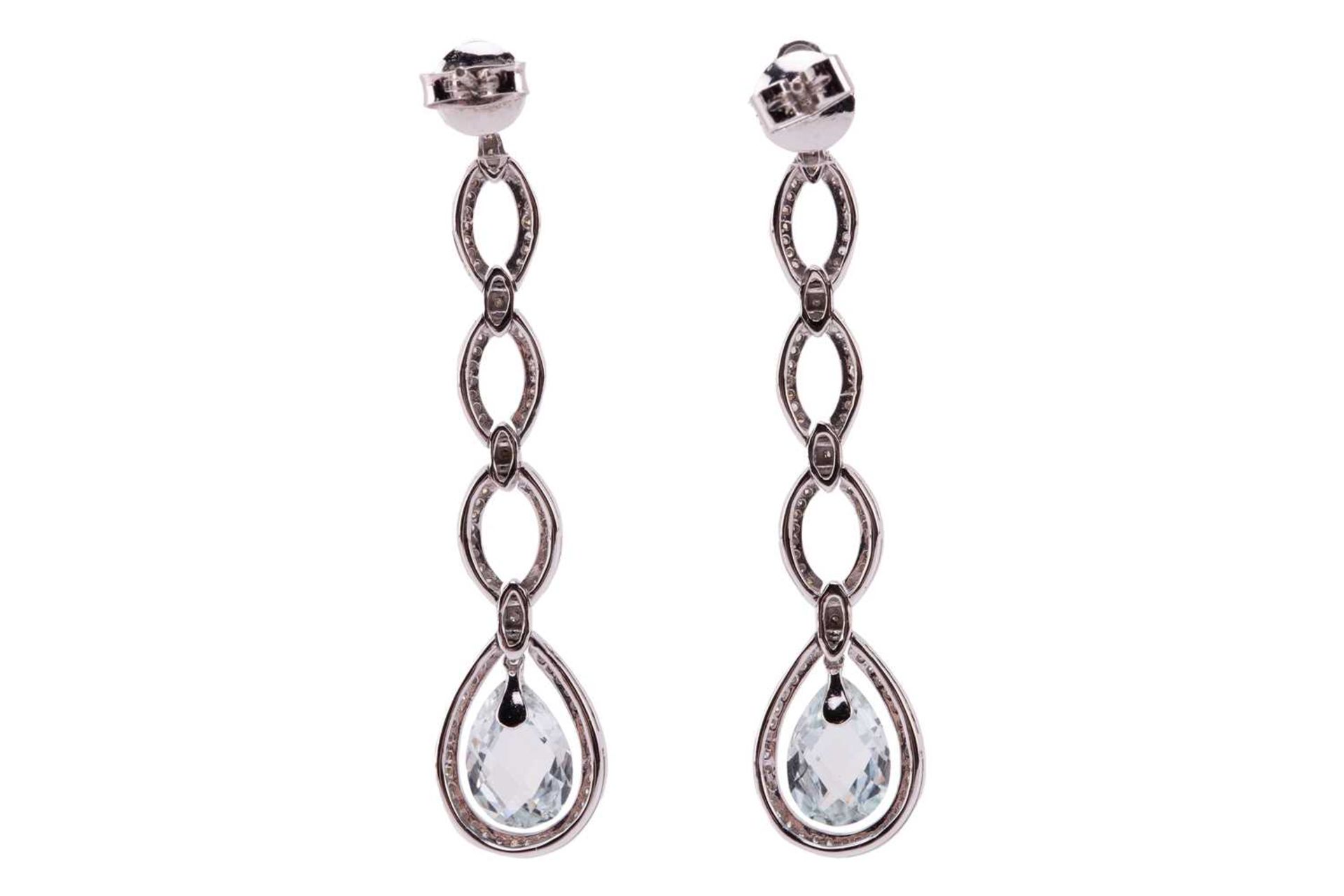 A pair of diamond and aquamarine dangle earrings, each containing a chequerboard-cut aquamarine drop - Image 2 of 2