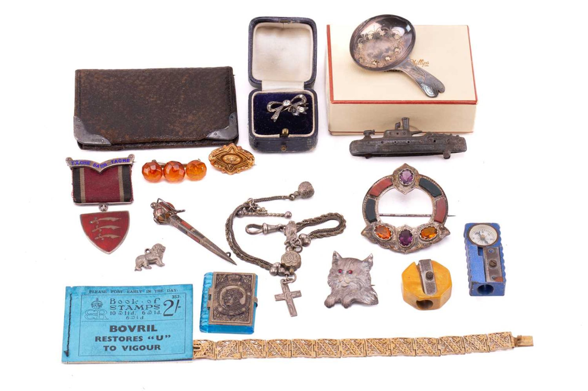 A collection of costume jewellery and other items to include a Scottish brooch set with paste and