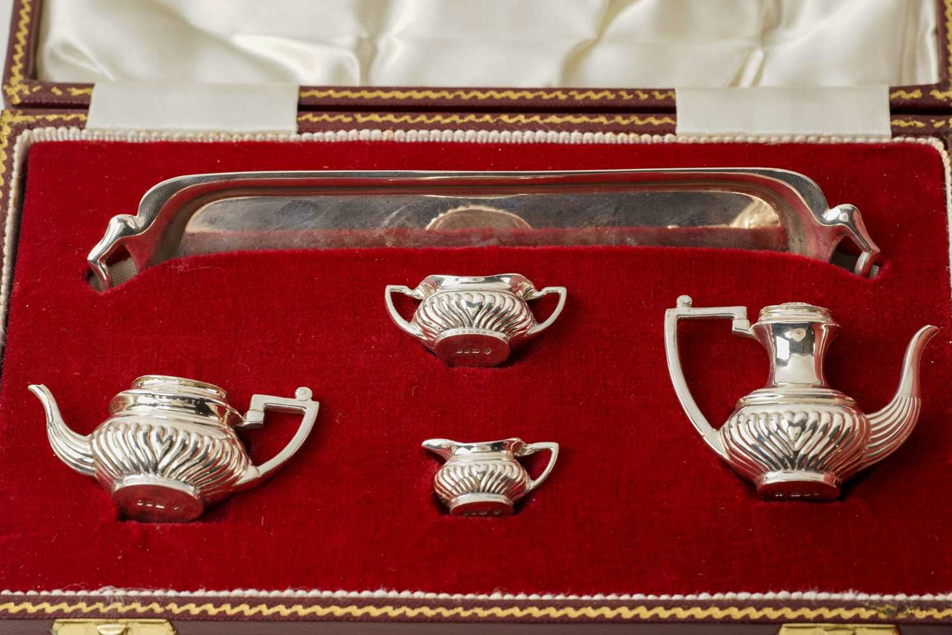 A cased miniature silver five piece doll size teaset, London 1983 by A Haviland -Nye together with - Image 2 of 15