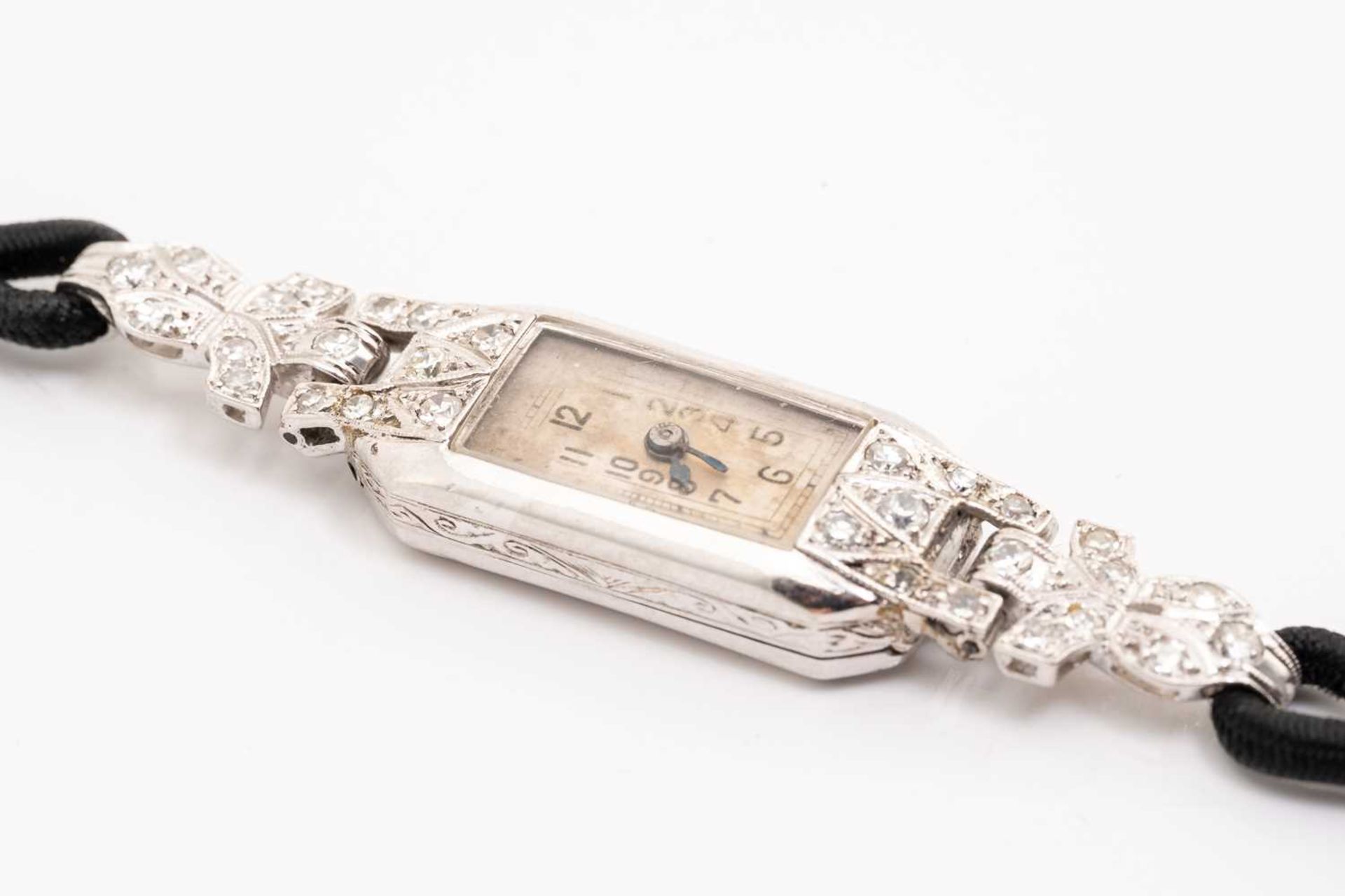 An Art Deco platinum and diamond set cocktail watch, the silvered dial with Arabic numerals, with - Image 2 of 7